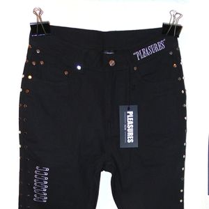 PLEASURES Nevada denim pants.